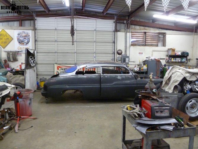The car in the shop.