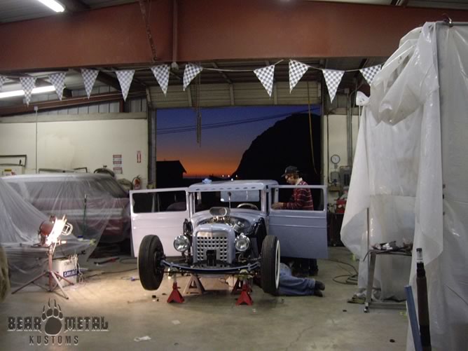 Working on the Chrysler with the Morro Bay sunset in the background