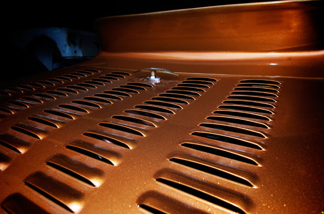 Louvers on the hood of the Oldsmobile.